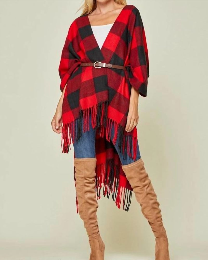 Front of a model wearing a size one-size-fits-all Buffalo Plaid Wrap In Red in Red by ANDREE BY UNIT. | dia_product_style_image_id:350791